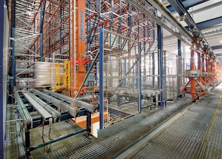 The installation of stacker cranes is an example of industrial process automation in logistics